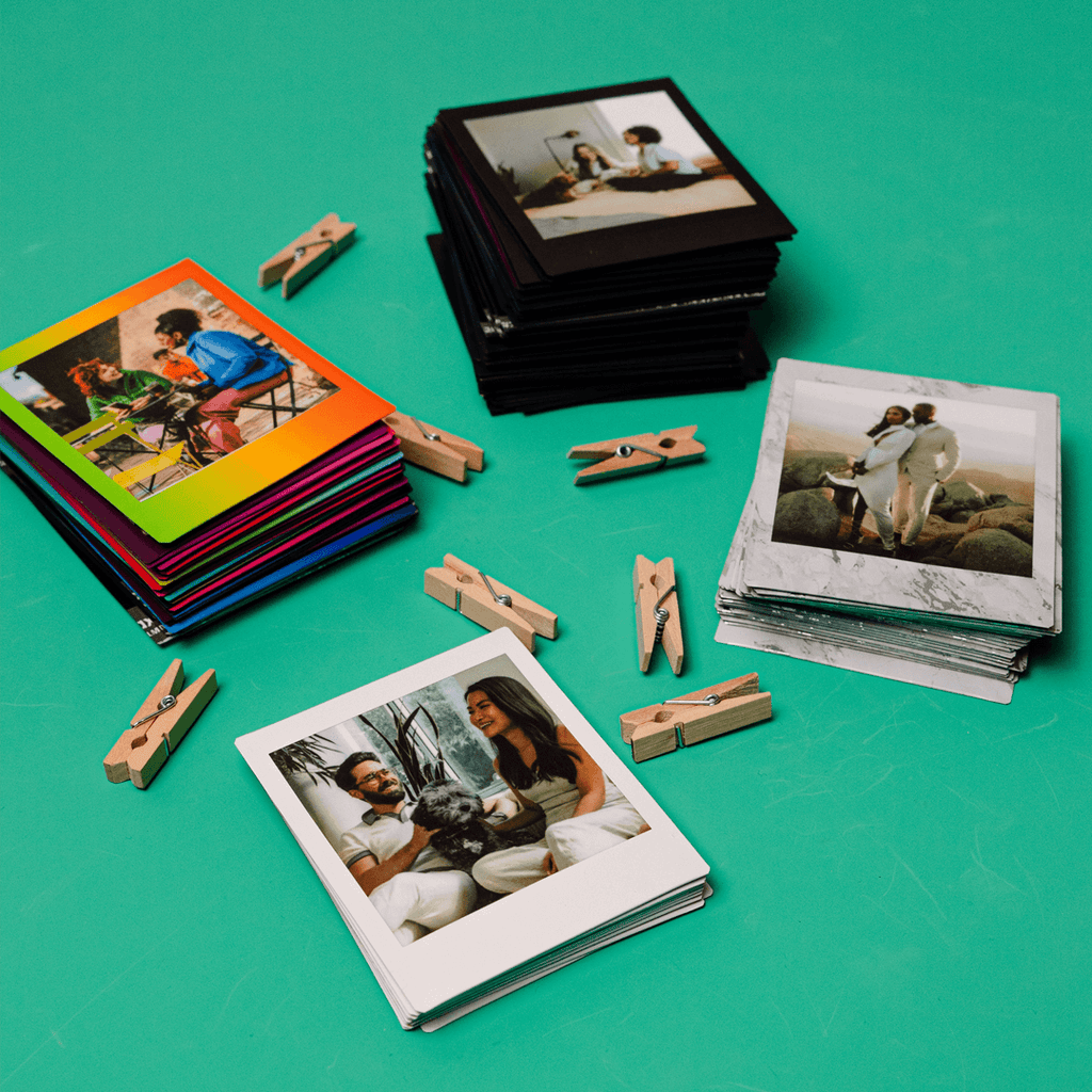 Sfeerafbeelding instax™ SQUARE film met witte rand, instax™ SQUARE film Black Frame, instax™ SQUARE film Rainbow en instax™ SQUARE film Marble